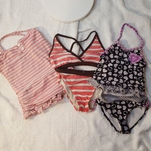 Three beautiful little girl swimsuits